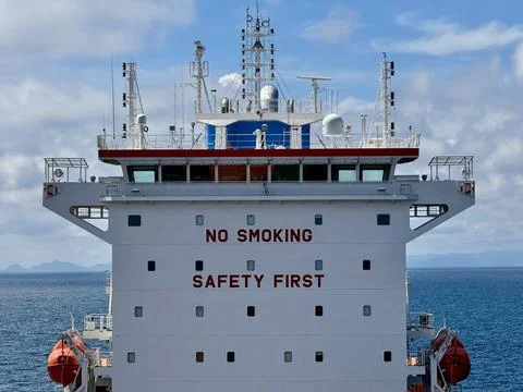 Container Ship Bridge Front with Safety First and No Smoking Signs Stock Photos