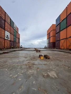 Container Ship Cargo Deck Between Rows of Shipping Containers Stock Photos