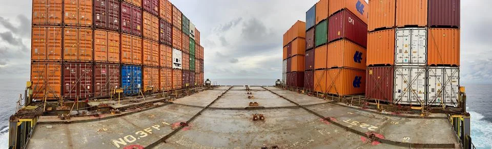Container Ship Cargo Deck with Stacked Shipping Containers Stock Photos