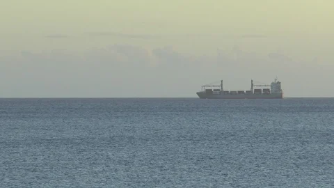 Container ship In A Caribbean Sunset Stock Footage 108054191