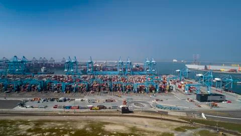 Container ship carrying container box loading in import export and business Stock Photos
