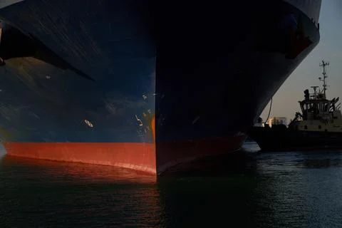 Container ship close - up. Part of large merchant ship Stock Photos