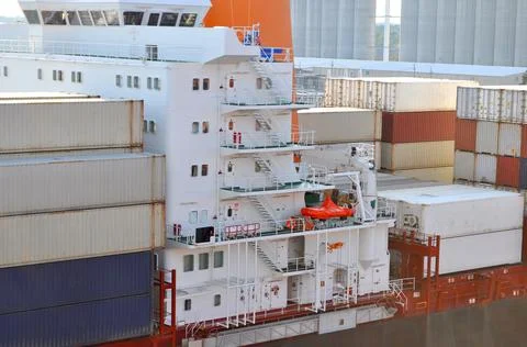 Container ship close - up. Part of large merchant ship Stock Photos