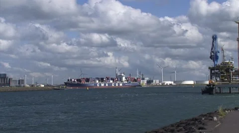 Container ship CMA CGM Maupassant (France) navigates in seaport - wide shot Stock Footage 44352090