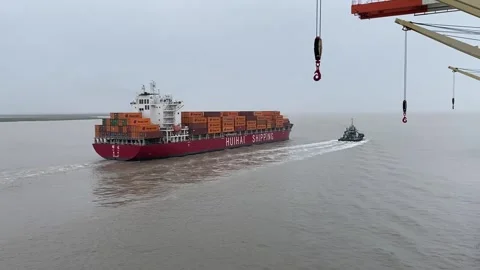 Container Ship Docked at Port with Crane Loading Stock Footage 343334155