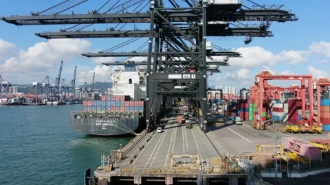 Container Ship docked at port during loading and unloading operation. Stock Footage 154292150