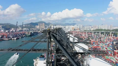 Container Ship docked at port during loading and unloading operation. Stock Footage 154292241