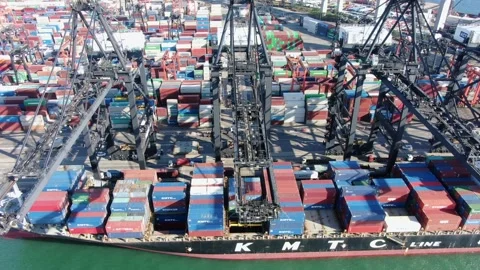Container Ship docked at port during loading and unloading operation. Stock Footage 154293029