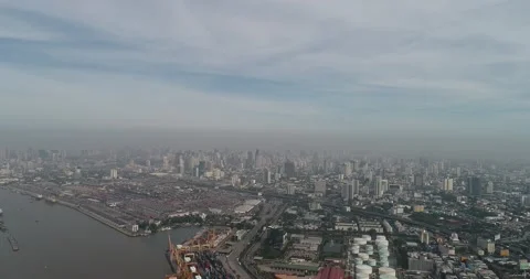 Container ship in export and import business and logistics in city Stock Footage 134975522