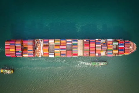 Container ship in export and import business and logistics. Aerial view. Stock-Fotos