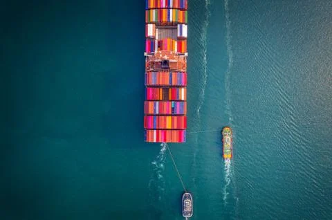 Container ship in export and import business and logistics. Aerial view. Stock-Fotos