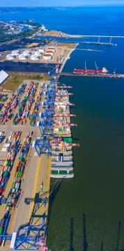 Container ship in export and import business and logistics. Shipping cargo to Stock Photos