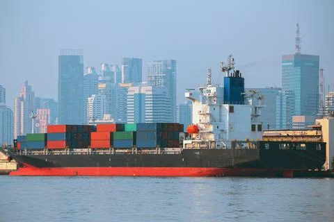 Container ship in export and import business and logistics. Stock Photos