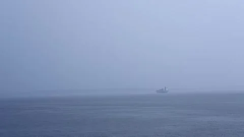 Container ship floating in foggy cloud. Cargo ship in mist or rain cloud Video stock 321025683