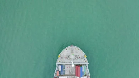 Container ship import export business logistic in sea with tugboat Shipping to 스톡 동영상 336446572