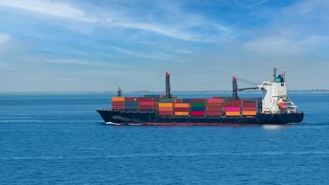 A container ship on its way to the next port Foto stock