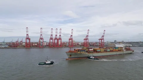 Container ship leaves Liverpool2 deep water dock, Merseyside, England Stock Footage 272170796