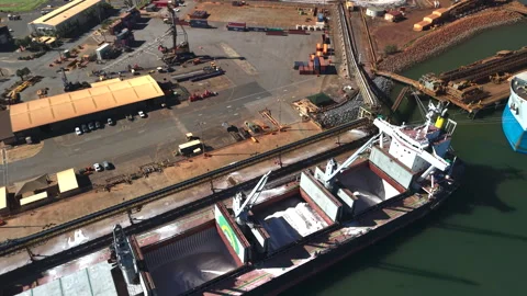 Container ship loaded up with raw material aerial in Port Hedland in the Stock Footage 344050951