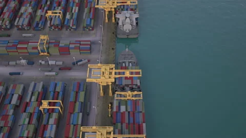 Container ship loading and unloading in deep sea port, Aerial view of business l Video stock 164191754