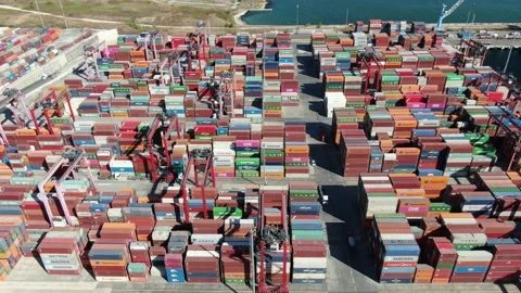 Container ship loading and unloading in deep sea port, Stock Footage 168324466
