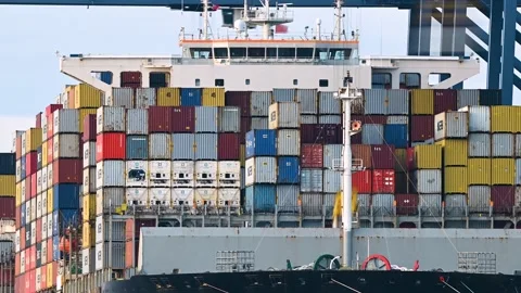 Container ship loading and unloading in deep sea port, time-lapse of Video stock 168350315