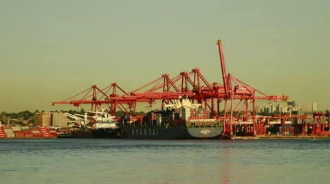 Container ship loading onto boat Video stock 12459691