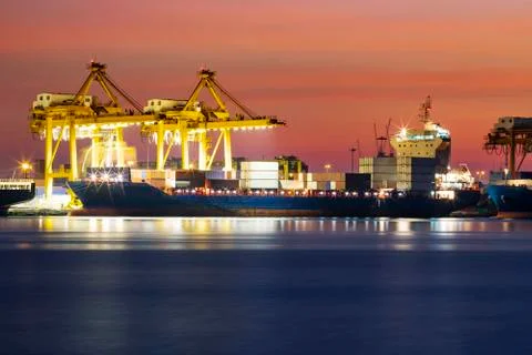 Container ship loading container box at logistic industry port Stock-Fotos