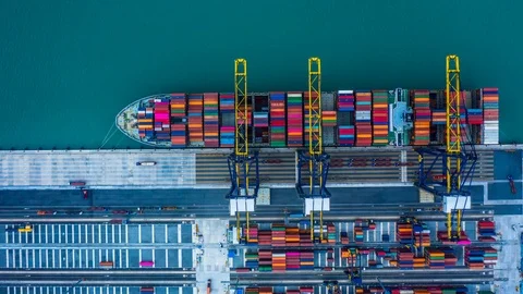 Container ship loading at deep sea port, 4K Aerial view timelapse Stock Footage 103008654