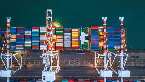 Container ship loading at deep sea port, 4K Aerial view timelapse Video stock 103015079