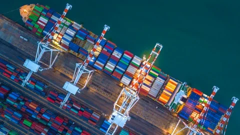 Container ship loading at deep sea port, 4K Aerial view timelapse Stock Footage 103023320