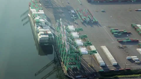 Container Ship at Loading Dock in Harbor Stock Footage 11633571