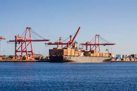 Container ship at loading wharf Stock Photos