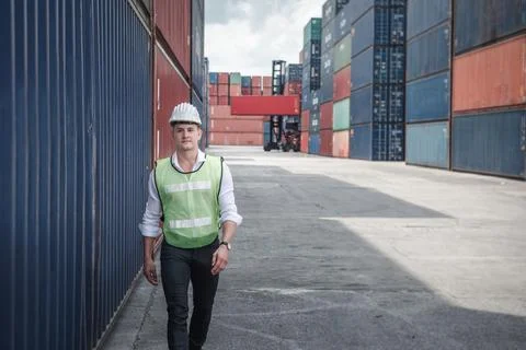Container Ship Logistics Engineer Worker is Working in Yard Shipping Terminal Stock Photos