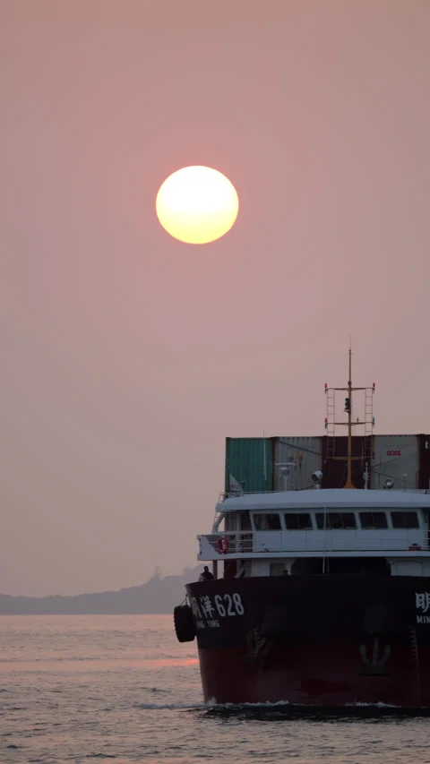 Container Ship Ming Yang 628 Sailing at Sunset near Hong Kong Stock Footage 304652861