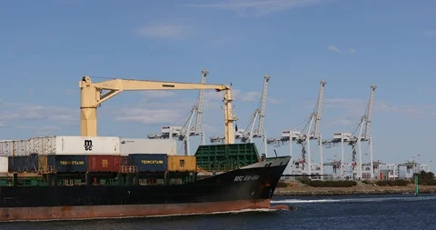 Container ship MSC KIA-ORA departing Port Melbourne into Port Phillip Bay. Stock Footage 99070027