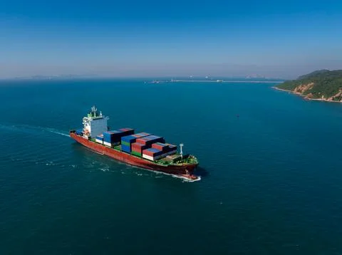 Container Ship Navigating Blue Ocean Waters Off Si Racha Coast High Angle Sho Stock Photos