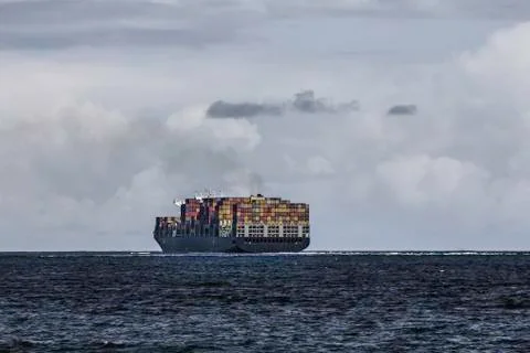 Container ship on the ocean Fotos de archivo