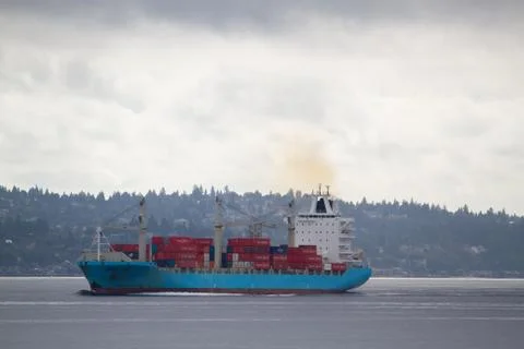 Container ship on overcast day 스톡 사진