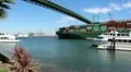 Container Ship Passes Under Bridge HD Footage