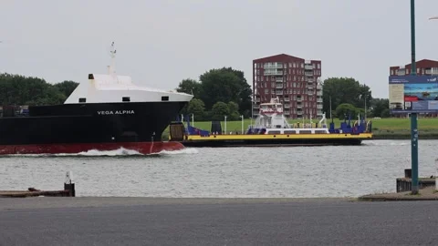 Container ship passing ferry Video stock 312376165