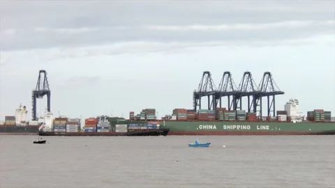 Container ship passing port Stock Footage 91230149