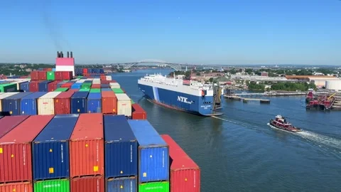 Container ship passing port to port side with car carrier near Bayonne Bridge Stock Footage 242828028
