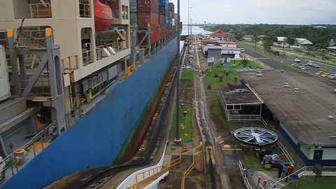Container ship is passing through Gatun Locks Stock Footage 98677199