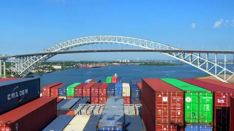 Container ship passing under the Bayonne Bridge on route to Newark Stock Footage 242827961