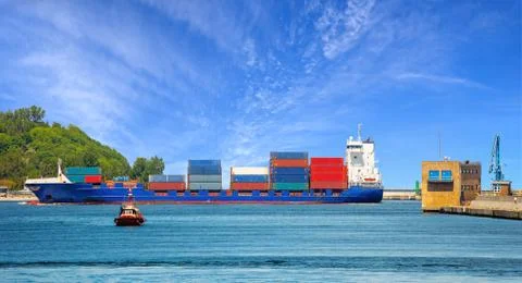 Container ship with pilot boat Stock Photos