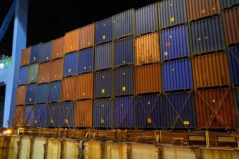 Container ship in port at container terminal. Ships of container ships stand  Stock Photos
