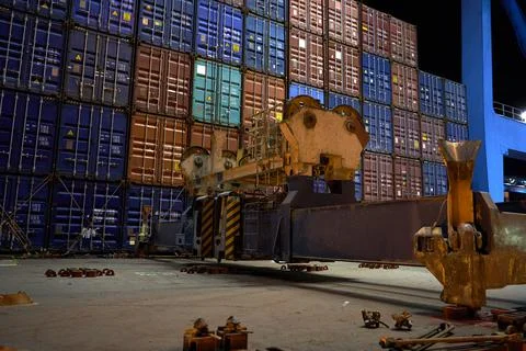 Container ship in port at container terminal. Ships of container ships stand  Stock Photos