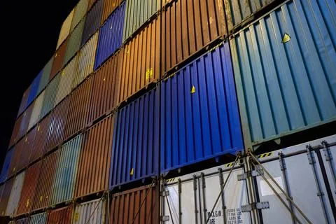Container ship in port at container terminal. Ships of container ships stand  Stock Photos