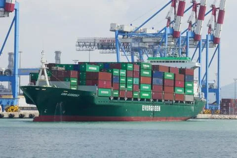 Container ship with port cranes Stock-Fotos
