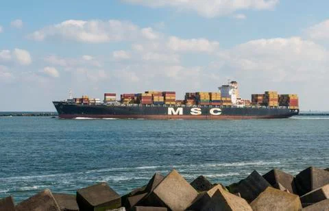 Container ship in port of rotterdam Stock Photos